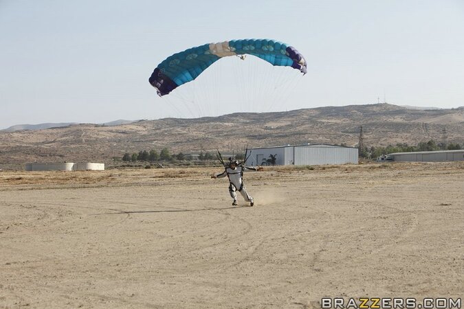 Thrill-seekers jump from a plane and practice threesome sex in the hangar