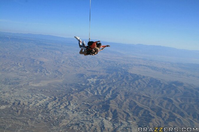 Thrill-seekers jump from a plane and practice threesome sex in the hangar