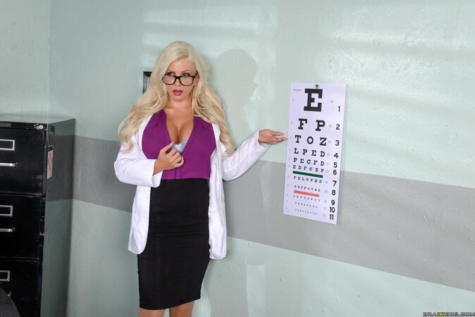 Pornstar strips down to stockings and reveals awesome tits to be carnal