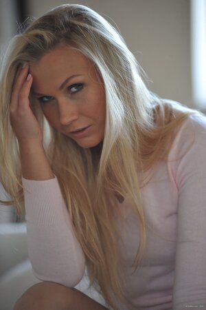 Playful blonde sexpot is not afraid to undress and expose her sexy curves