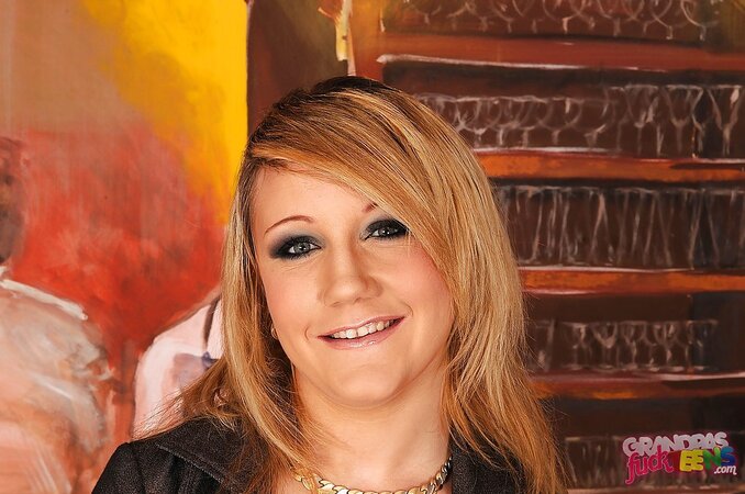 Juicy blond nympho strips off her clothes to tease with tempting naked body