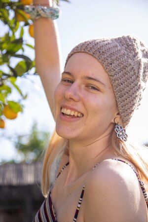 Clara M is showing off her naturally small boobs and more