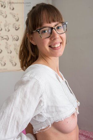 Geeky babe named Leah shows her natural boobs and beyond