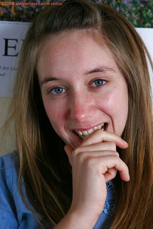 Ariane the horny solo beauty grabs her bush and fingers herself