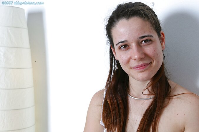 Confident and cute Lilou is ready to show us her bushy vag