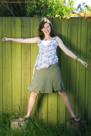 Teen girl looks cute as she shows off her incredible bush