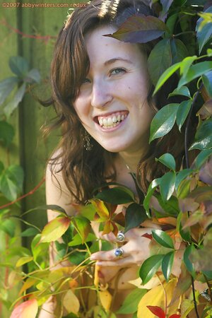 Teen girl looks cute as she shows off her incredible bush