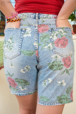 Adorable teenager with a cute look in her eyes masturbates HARD