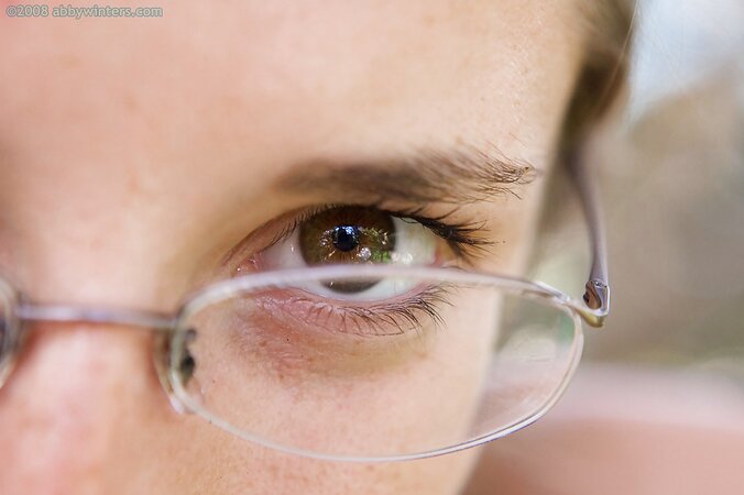 Girl in glasses is going to show her ass and tan lines too
