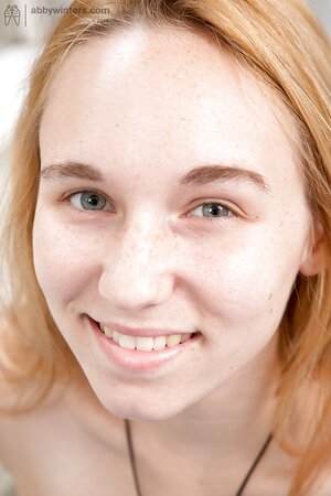 Natural boobs babe keeps her legs raised as she shows her body