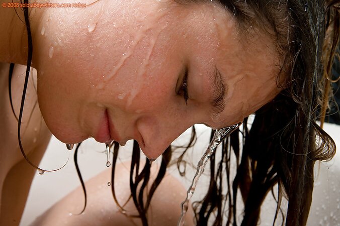 Small boobs babe Violeta showing her wet body for the cam