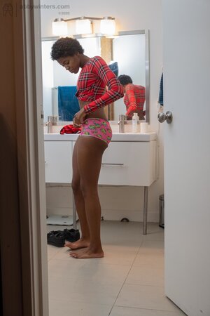 Small boobs ebony girl showing her long legs and teasing too