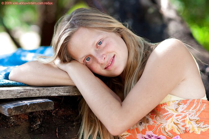 Blondie with long legs and firm ass is going to tease outside