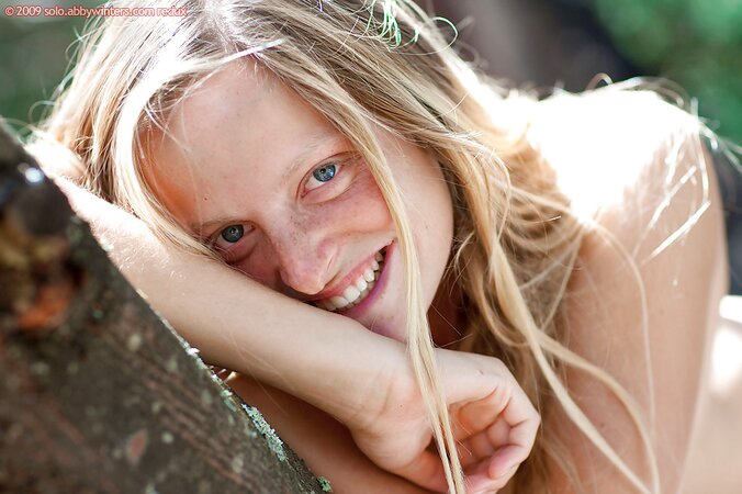 Blondie with long legs and firm ass is going to tease outside