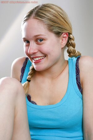 Pigtailed blondie shows her flexibility and gets off as well