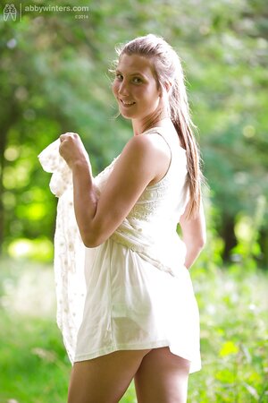 Blondie in a sexy getup masturbates in the middle of nowhere