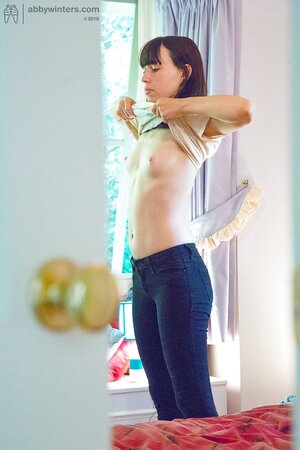 Girl with faultless hair is gonna showcase while topless mostly