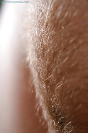 Redheaded beauty shows her crotch and sexy looking booty