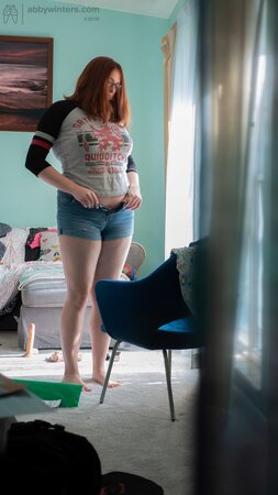 Curvy redhead Breanna is going to show her black panties too