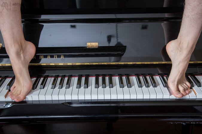 Thin geek with boyish hair shows her hairy muff up close