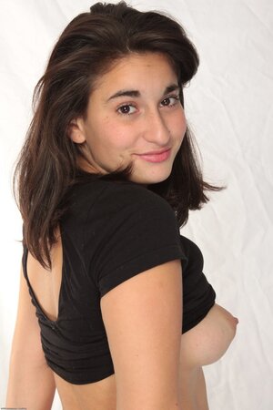 Brunette looks very confident while showing her pink twat