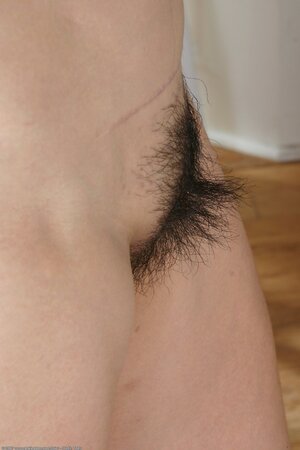 Hot Asian lady shows her bush and looks incredible as well