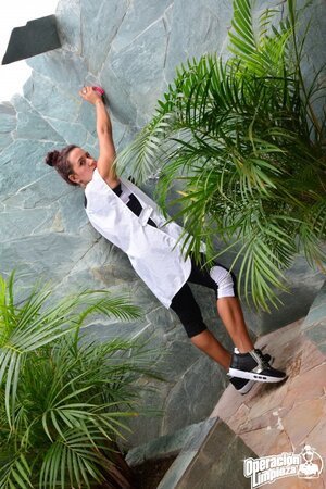 Alluring babe with a firm ass is going to expose her slit