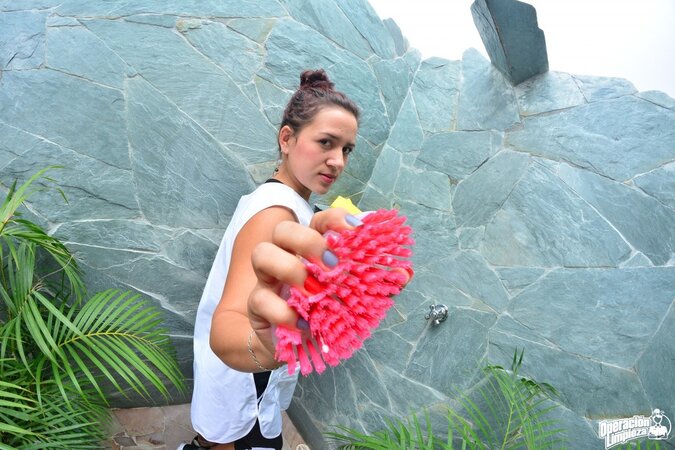 Alluring babe with a firm ass is going to expose her slit