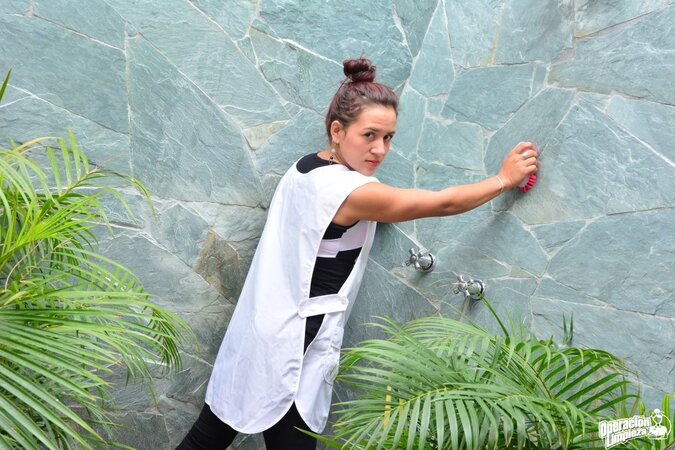 Alluring babe with a firm ass is going to expose her slit