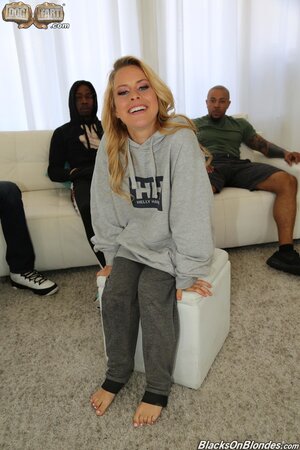 Blondie looks charming as she gets two dicks really stiff