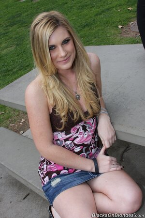 Blondie with a shaved pussy is ready to pleasure black men