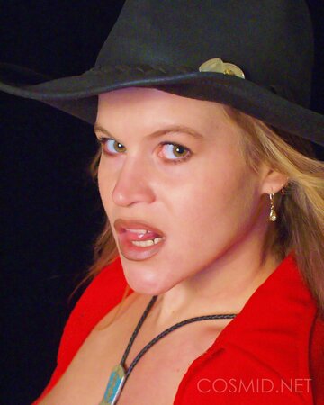 Sexy hat lady is here to showcase her boobies and look great