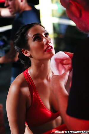 Two girls duke it out before fucking the ref in the ring