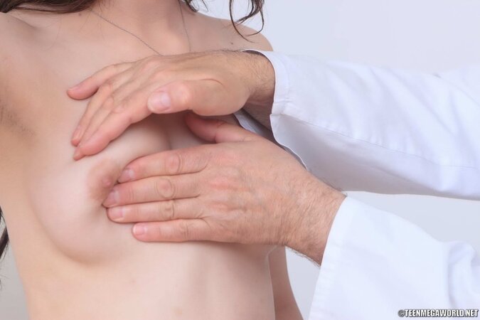 Playful lady is bending over and arching her back like a tramp