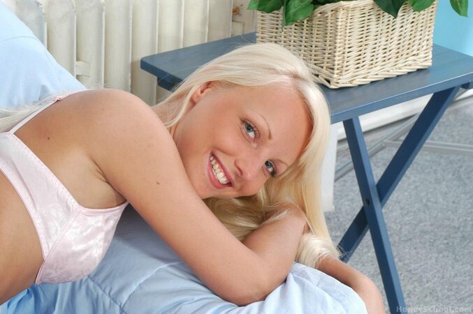 Russian chick with pretty eyes sucking a cock and taking it deep