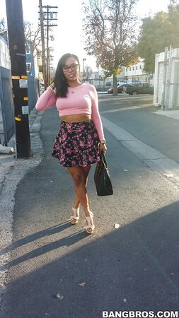 Cute wife Porsha Carrera bends over and flashes her big booty