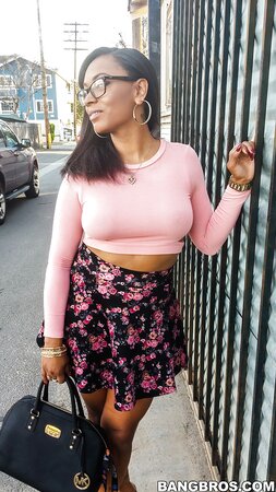 Cute wife Porsha Carrera bends over and flashes her big booty