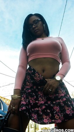 Cute wife Porsha Carrera bends over and flashes her big booty