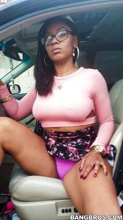 Sexy ebony Porsha Carrera shows off her bangable ass in the trunk