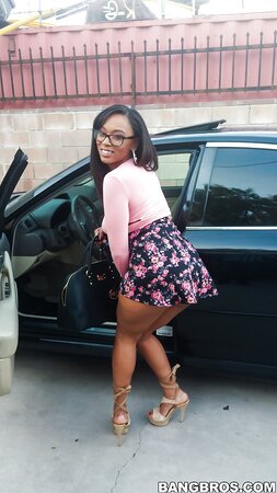 Sexy ebony Porsha Carrera shows off her bangable ass in the trunk