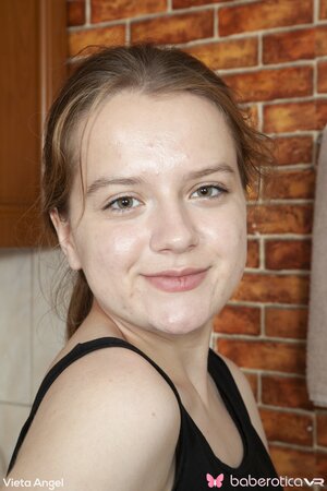 Innocent teen Vieta Angel strips down and flaunts her pussy