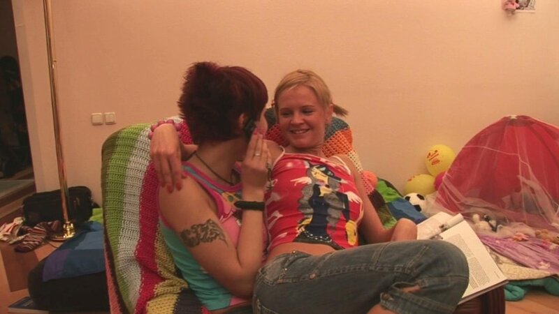 Lesbians Ksusha C and Nataly fuck on a couch with their sex toys