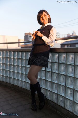 Cute Japanese schoolgirl likes to show off her perky tits
