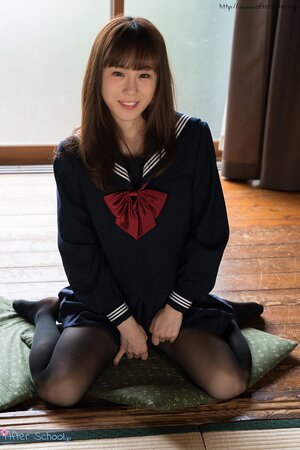 Petite Japanese schoolgirl gets naked to show off her sexy body