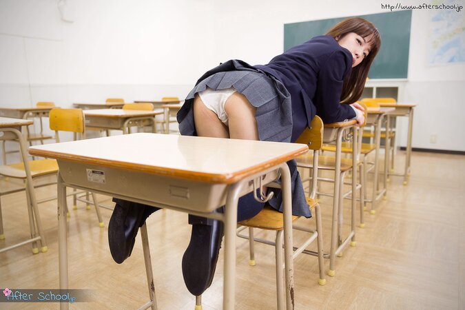 Asian teen decides to expose her bald cunt in the classroom