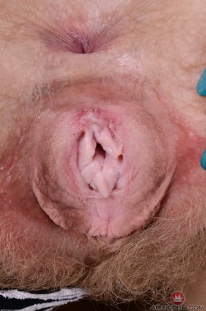 Busty whore fondles her tits to spread her pussy lips later