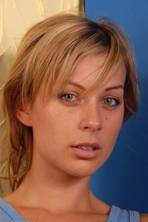 Short hair girl named Viki gives you a view of her soles too