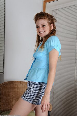 Cheeky seductress named Tabitha shows her ginger bush up close