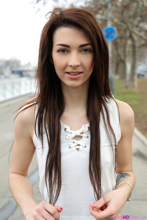 Hot brunette keeps her feet warm while getting fucked hardcore