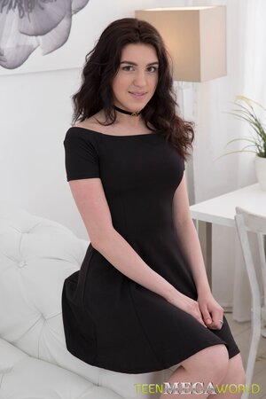 Brunette starlet kneels down to take a fat dick in her throat